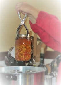 Pulling vegetable soup from the pressure canner