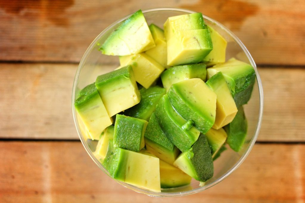 Avocado cubes in a bowl, reading for mashing or pickling - DepositPhotos..com